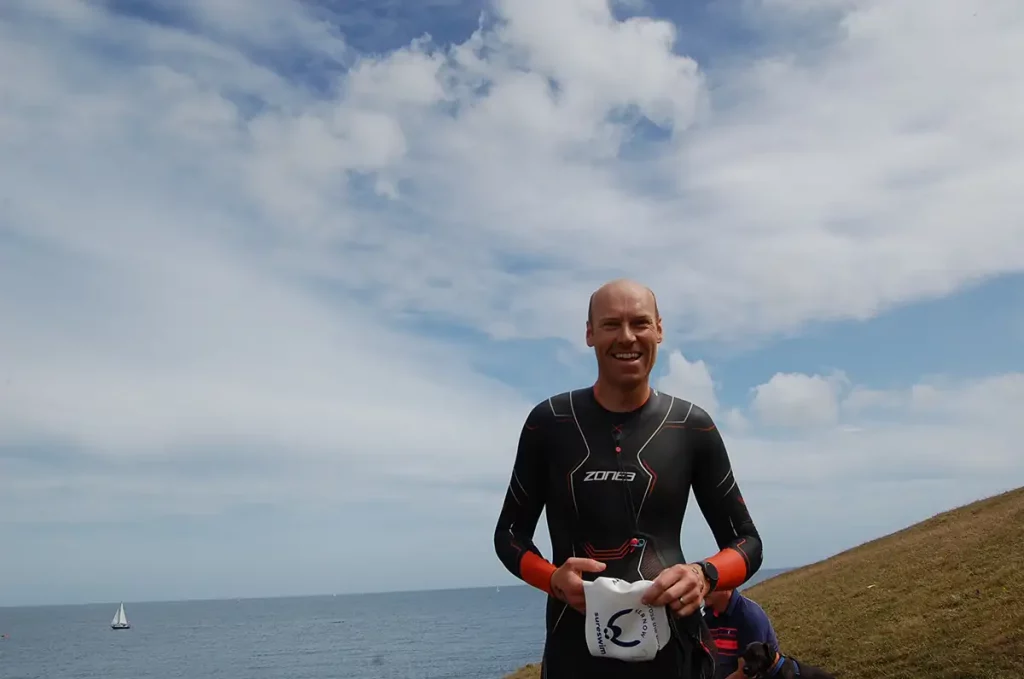 photo depicting Cancer Specialist Nick Battersby embarking upon a 5K open sea swim 