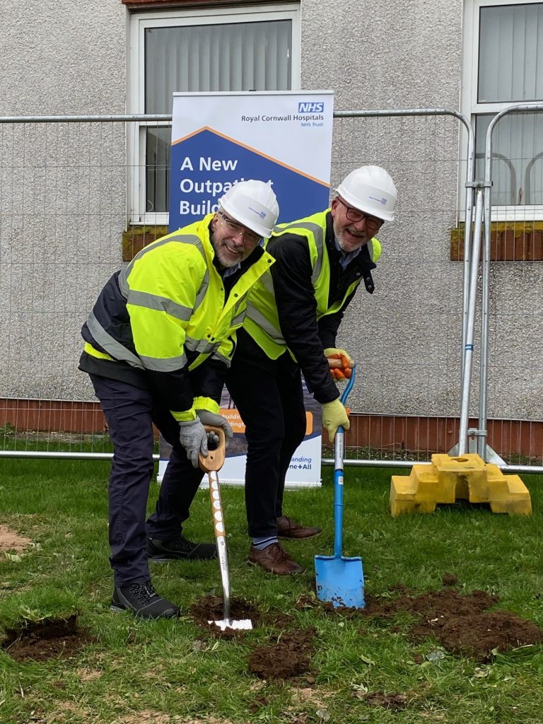 Steve Williamson and Paul Sylvester cutting the turf to celebrate the start of construction works for the new Outpatient Department